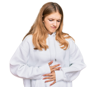 Beautiful young caucasian girl wearing casual sweatshirt with hand on stomach because indigestion, painful illness feeling unwell. ache concept.