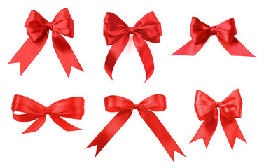 Beautiful red bows isolated on white, set