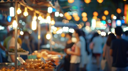 Defocused lights and shadows dance a the bustling street food vendors.