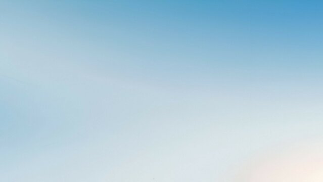 blue sky background with tiny clouds, soft pastel colors and gradient