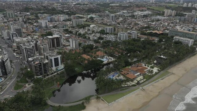 Drone orbits to the right above Lagoa da Anta next to Praia de Jatiuca in Maceio, Alagoas, Brazil