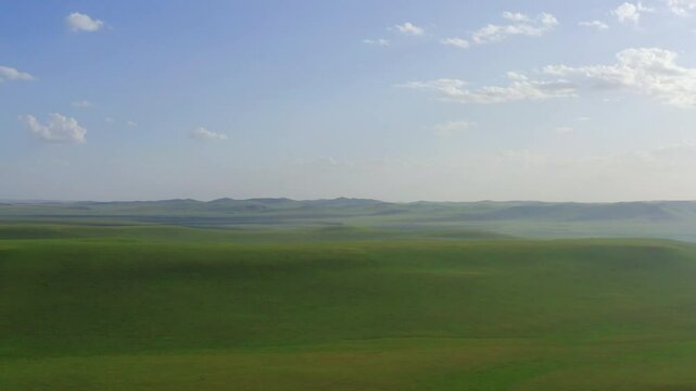 Aerial photography of the blue sky and white clouds of the Dada line in Keshiketeng Banner
