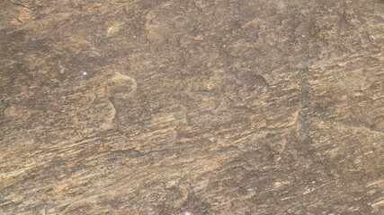 Mountain rock texture. Natural black slate granite slab marble stone ceramic seamless tile rough surface background.