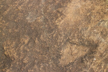 Mountain rock texture. Natural brown slate granite slab marble stone ceramic seamless tile rough surface background.