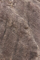 Mountain rock texture. Natural black slate granite slab marble stone ceramic seamless tile rough surface background.