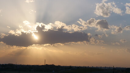 the sun hidden in the clouds