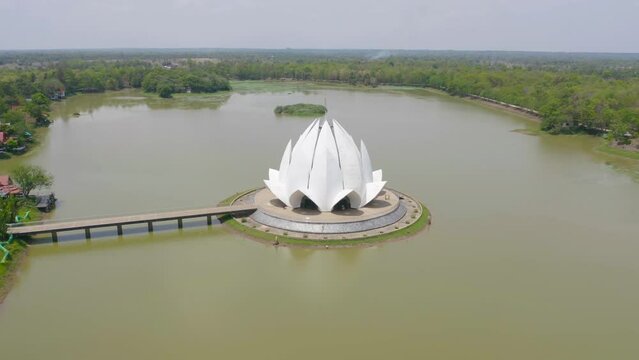 Wat Santiwanaram, Udon Thani, lotus temple pagoda is a buddhist temple in Udon Thani, an urban city town, Thailand. Thai architecture landscape background. Tourist attraction landmark.