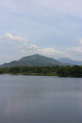 Fototapeta premium Mountain landscape, picturesque mountain lake in the summer morning, Beauty of nature concept background. lake and mountain on background in the morning time. natural landscape