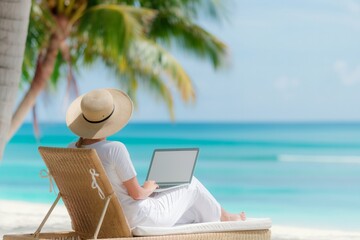 Young woman with laptop on a sun lounger, palm trees, ocean in the foreground, back view. Concept: digital nomad, remote work, work and life balance, freelancing