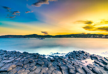 Sunset over basalt columns Giant's Causeway known as UNESCO World Heritage Site, Phu Yen, Vietnam