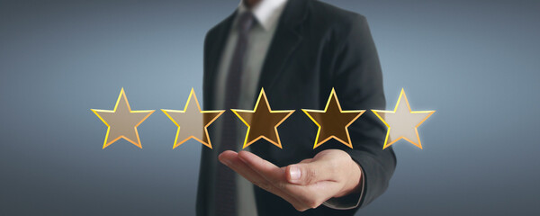 Rise on increasing five stars in human hand