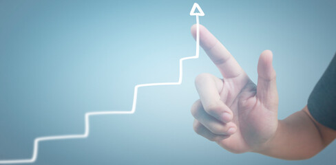 Hand touching graphs of financial indicator and accounting market economy analysis chart