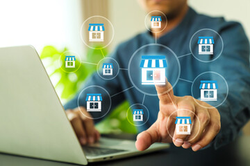 Hand choose franchise business store on arrow graph for franchising goal to growth branch expansion and business banking loan or consumer resources service.