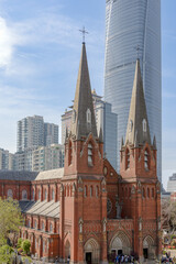 Obraz premium St. Ignatius Cathedral in Xujiahui, Shanghai, panoramic view of the main building of the Catholic church during daytime