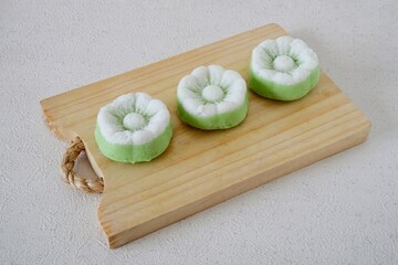 Indonesian Traditional steamed cake Kue Putu Ayu, made from rice flour, grated coconut and pandanus