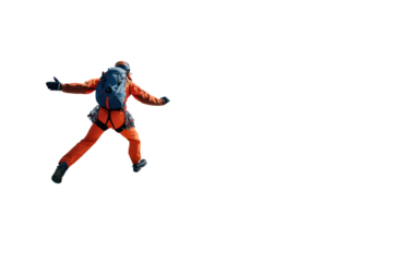 A person in a wingsuit skydiving against a white background, showcasing an extreme sport and adventure activity.