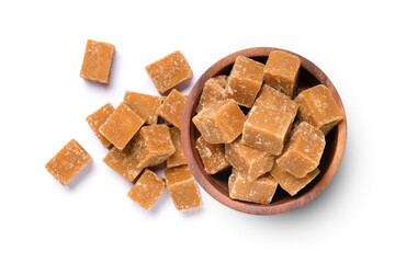Brown cane sugar cubes in wooden bowl  isolated on white background, top view, flat lay.