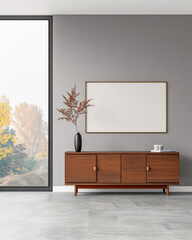 Modern sideboard next to a window providing natural lighting to a room in a residential interior design composition. Real Estate home decor scenes.