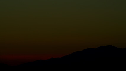 Sunrise. Sun Rising Behind The Mountain. Dramatic Sunrise Sky Over Mountains. Timelapse.