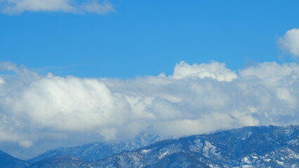 Fascinating Nature View. Trees With Revealing Snow-Capped Mountains. Timelapse.