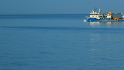 Fishing Boat Trawler Ship Sailing On Sea. Fishing Boat Sailed From The Coast. Still.