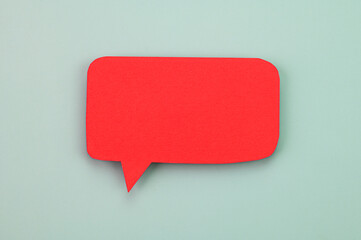 Red speech bubble on blue background