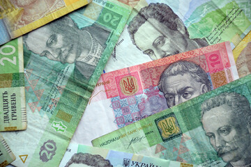 Processed collage of Ukrainian Hryvnia UAH bills banknotes texture. Background for banner