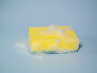 Close-up of Yellow Dish Washing Sponge,foamy cleaning sponge