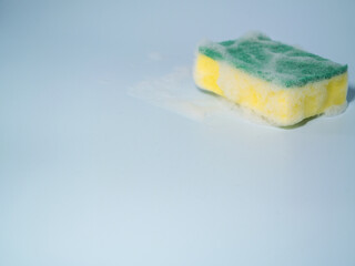 Close-up of Yellow Dish Washing Sponge,foamy cleaning sponge
