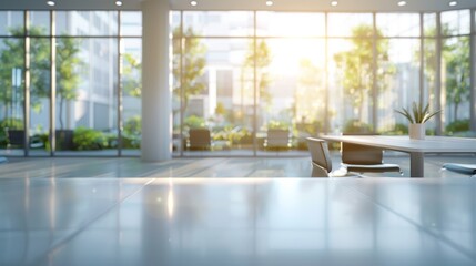 A modern office interior with a blurred background, white desk and glass wall, blurred focus on an open space or conference room table