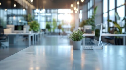 A modern office interior with a blurred background, white desk and glass wall, blurred focus on an open space or conference room table