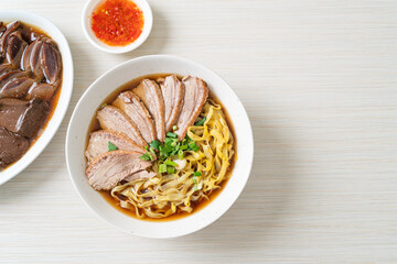 egg noodles with stewed duck in brown soup
