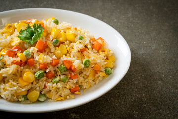 fried rice with mixed vegetable (carrot, green bean peas, corn) and egg