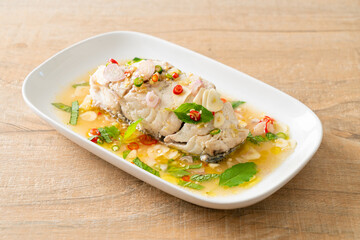 steamed sea bass fish with herbs