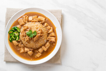 Chicken in brown sauce or gravy sauce with rice