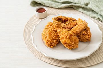 fried chicken with ketchup on plate