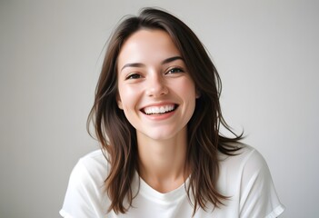 Fototapeta premium Positive smiling woman on white background