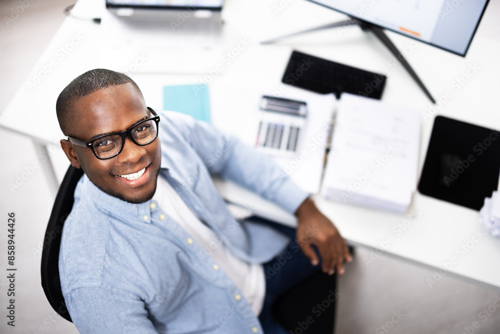 Poster successful african american business advisor man laughing while using a computer
