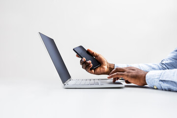 Busy African-American Man Multitasking on Smartphone