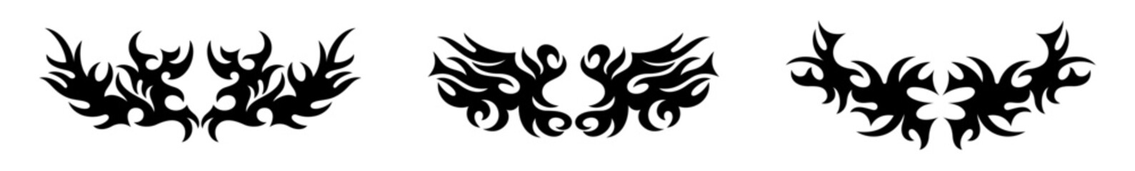 Horizontal symmetrical wings in the style of Gothic ornament. Trendy neo-tribal tattoo design elements. Vector art