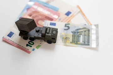 concept four rockets sent upwards against a hundred dollar banknote money background. Weapons of...