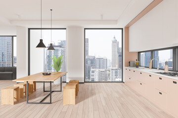 Stylish home interior with cooking and relaxing space with couch and window