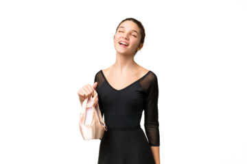 Teenager girl practicing ballet over isolated chroma key background laughing