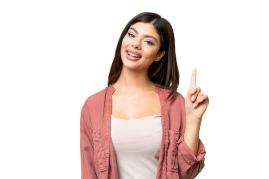 Young Russian woman over isolated chroma key background showing and lifting a finger in sign of the best