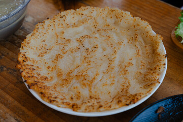 Close-up of Crispy Flatbread on White Plate Korean food