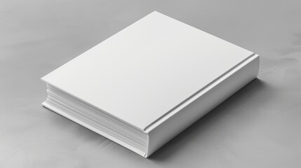 Fototapeta premium Minimalistic blank white book cover on a sleek gray surface, perfect for template design and branding, highlighting simplicity and elegance
