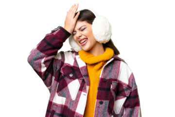 Young Russian woman wearing winter muffs over isolated chroma key background has realized something and intending the solution