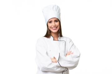 Young chef caucasian woman over isolated background with arms crossed and looking forward