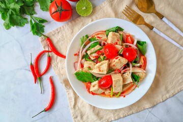 spicy vietnamese sausage salad with Salted egg yolk on white plate