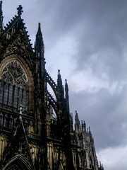 Fototapeta premium Cologne Cathedral against the dark and ominous stormy sky